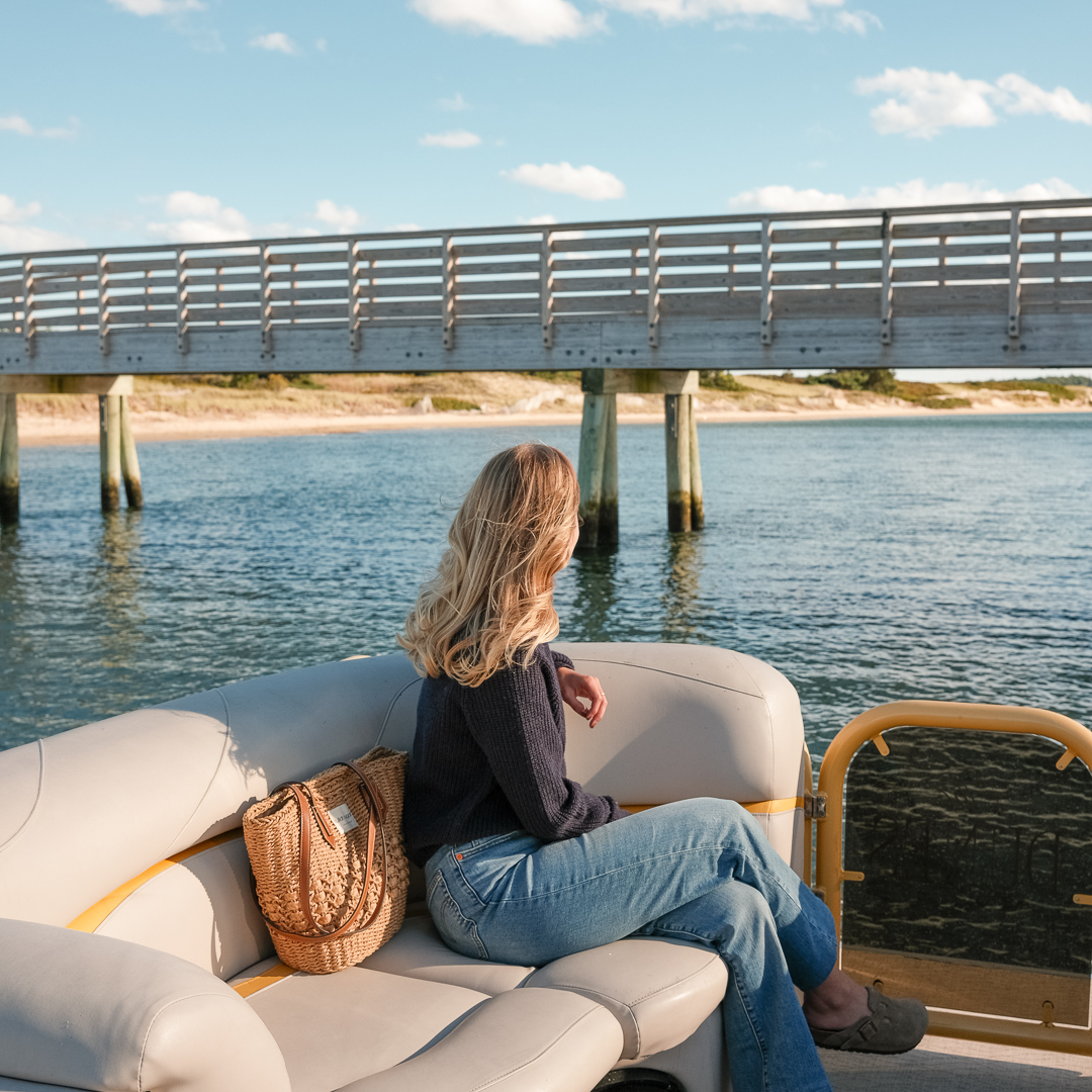 a woman sitting on a boat