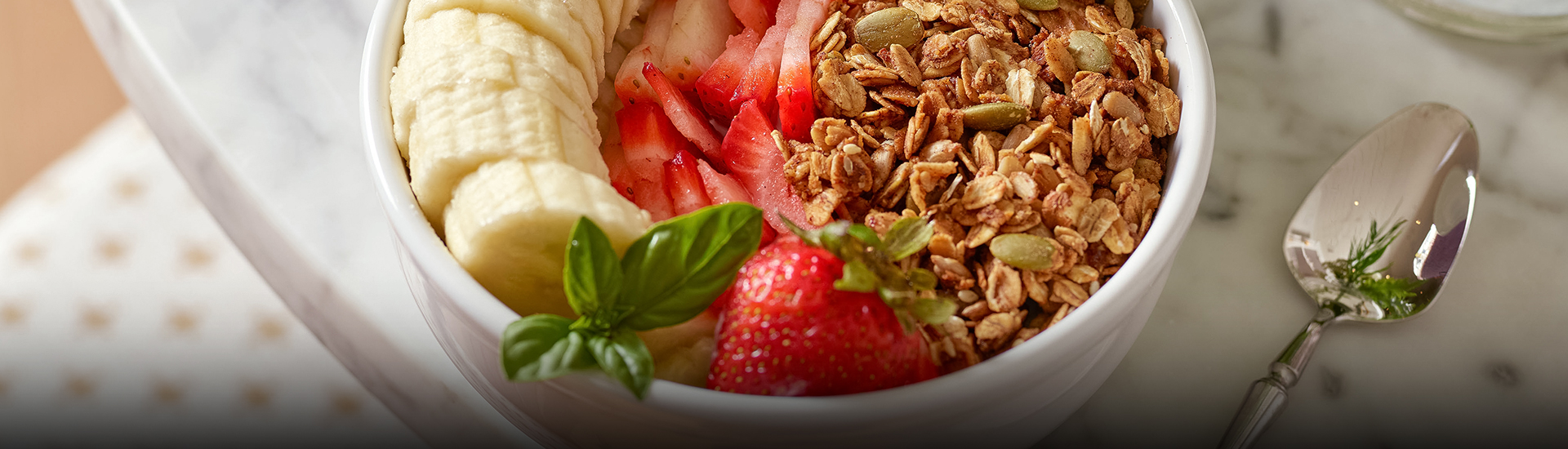 a bowl of granola and fruit