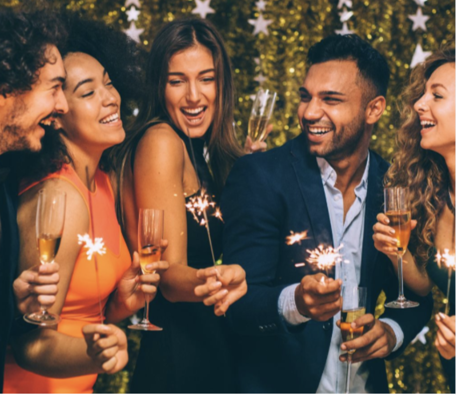 a group of people holding champagne glasses