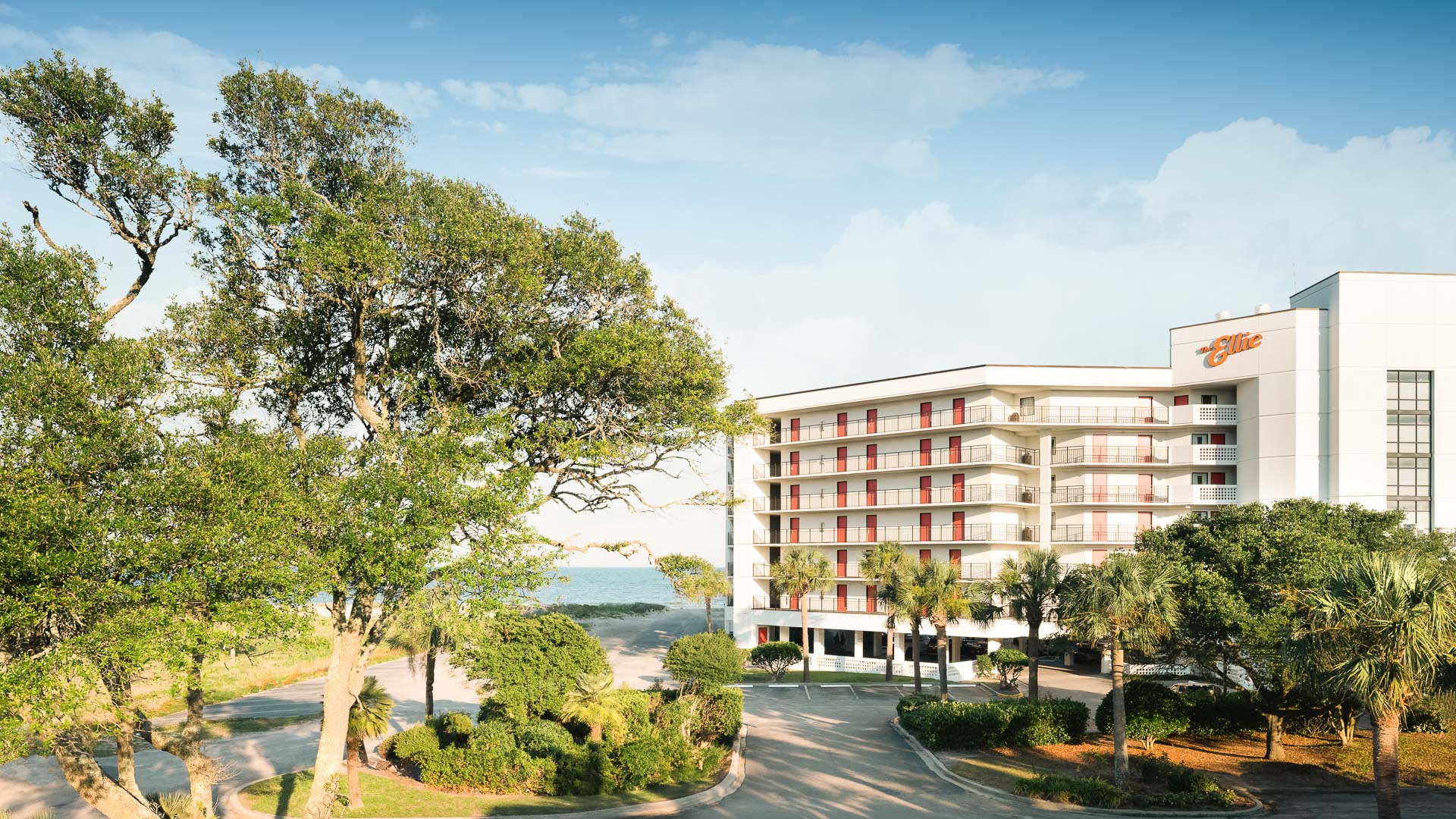 a building with trees and bushes