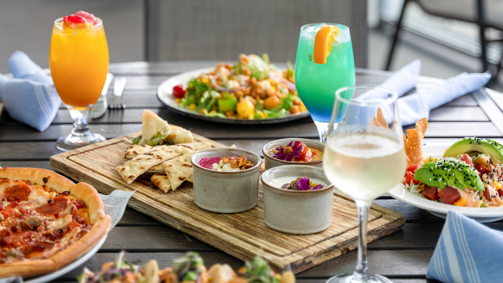 a plate of food and drinks on a table