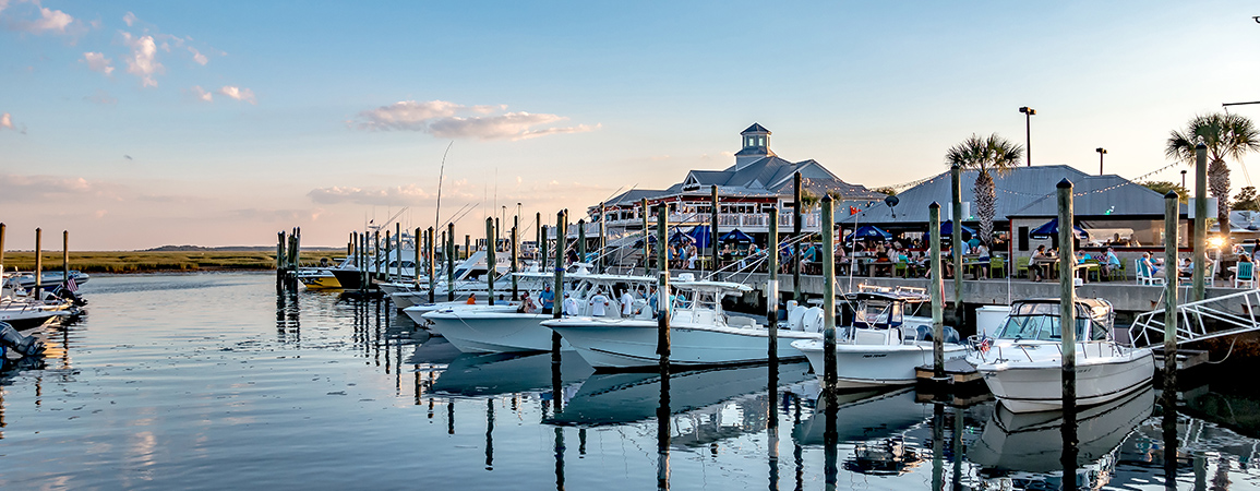 a group of boats in a harbor