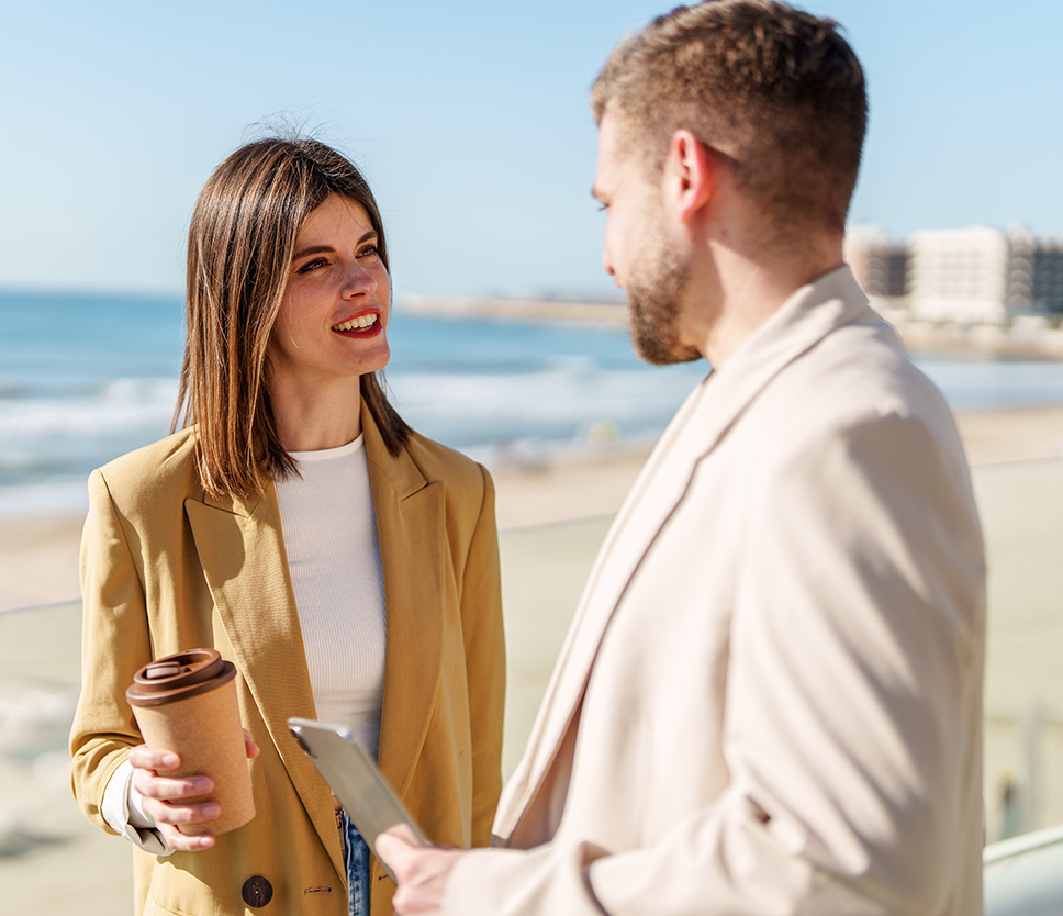 a man and woman standing next to each other