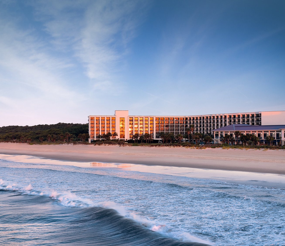 a large building on a beach