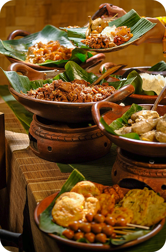 a group of bowls of food on a table
