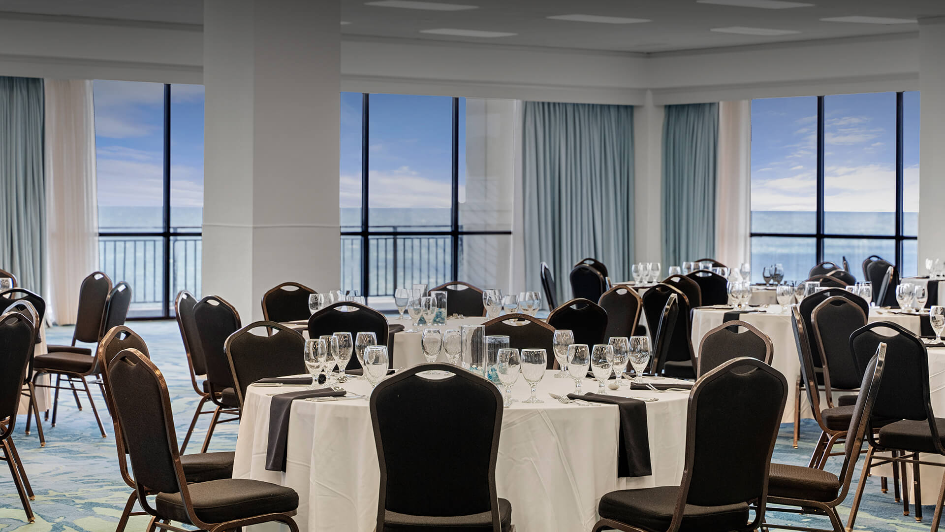 a room with tables and chairs