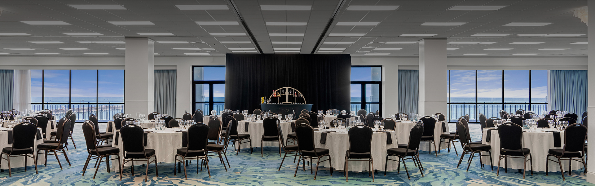 a large room with tables and chairs