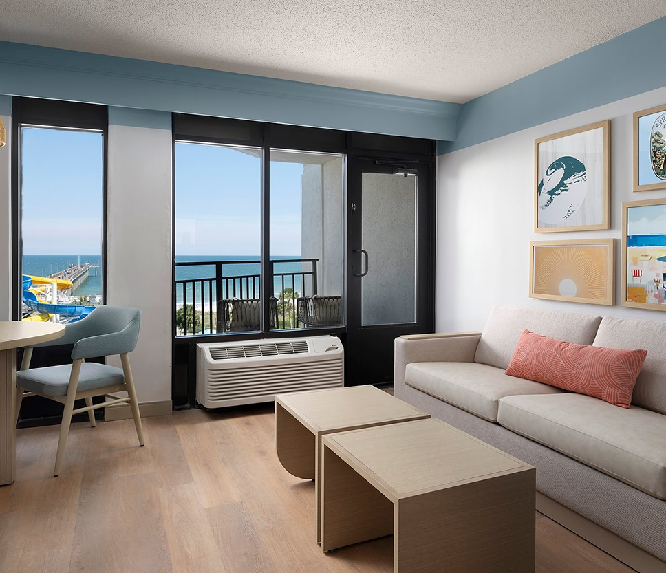 a living room with a couch and a table