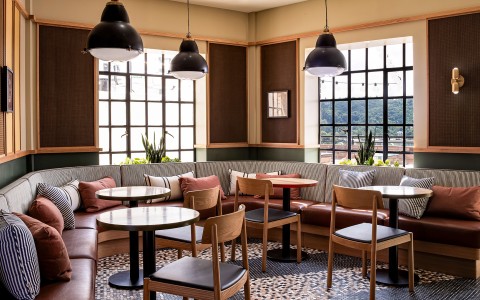 a room with tables and chairs