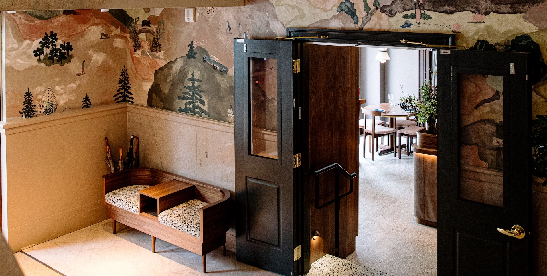 a door with glass and glass door open