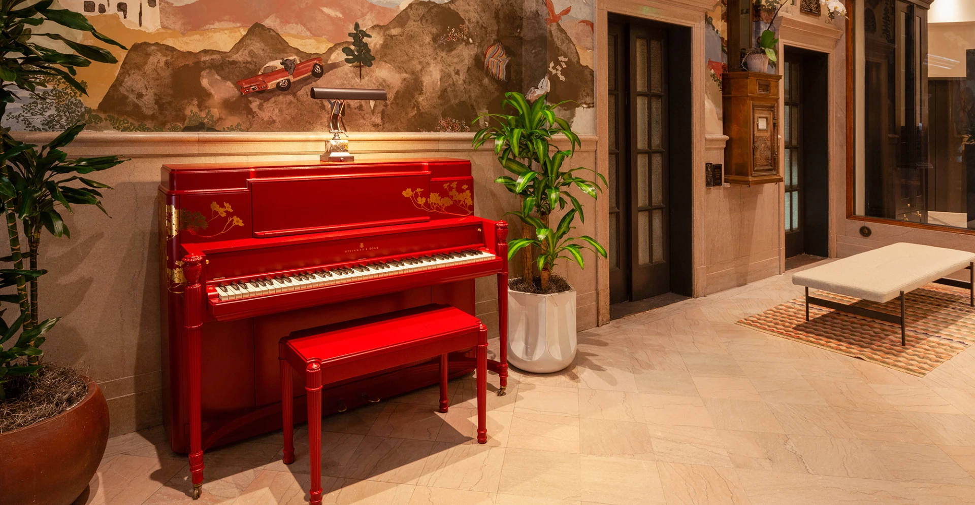 a red piano in a room