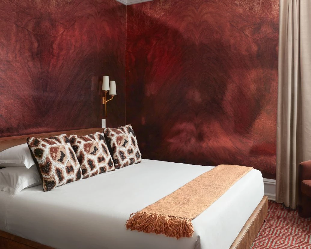 Post image for a bed with pillows in a room