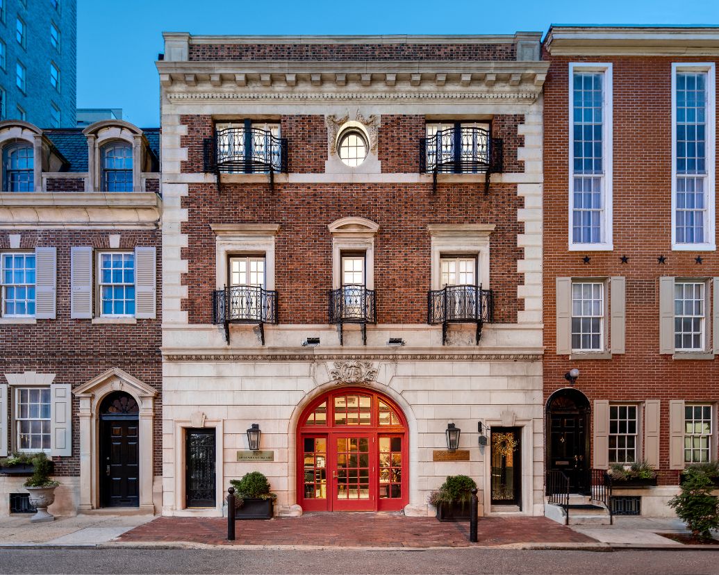 Post image for a building with a red door