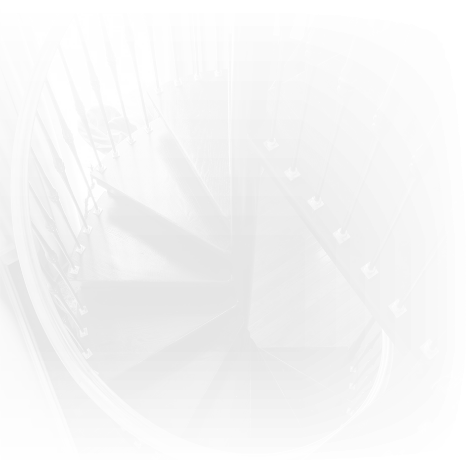 a spiral staircase in a dark room
