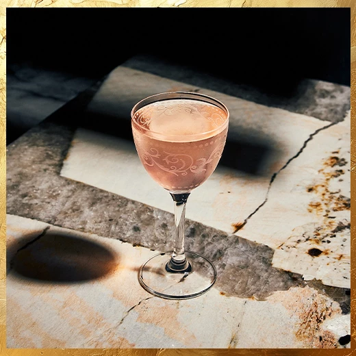 Post image for a glass of pink liquid on a marble surface