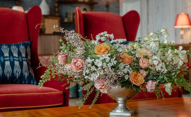 a vase of flowers on a table