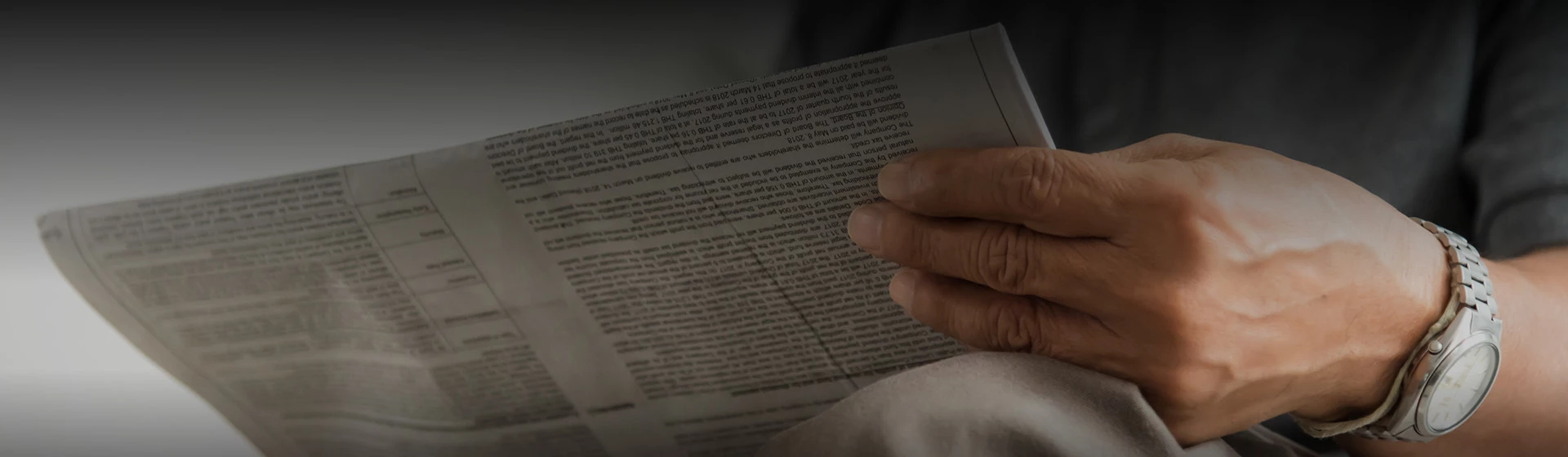 a person holding a piece of paper