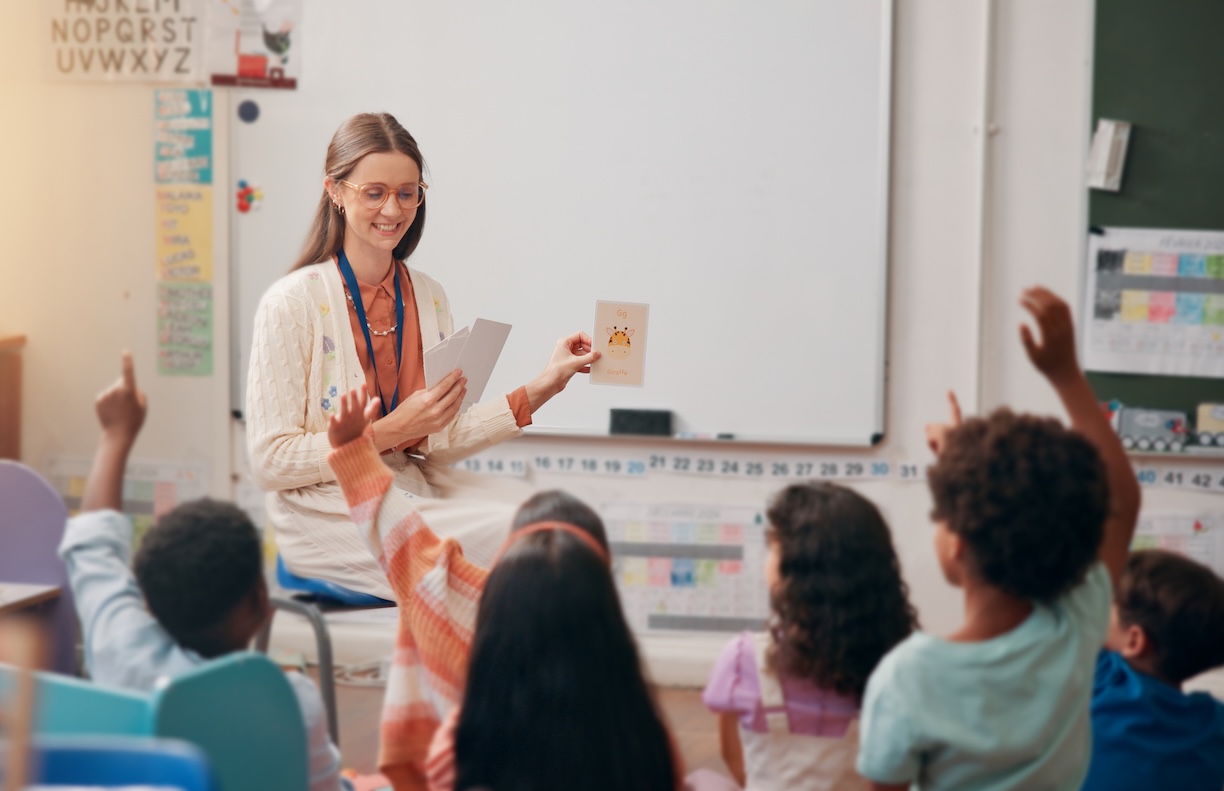 a woman teaching a group of children