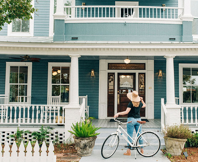 a person riding a bicycle  Next