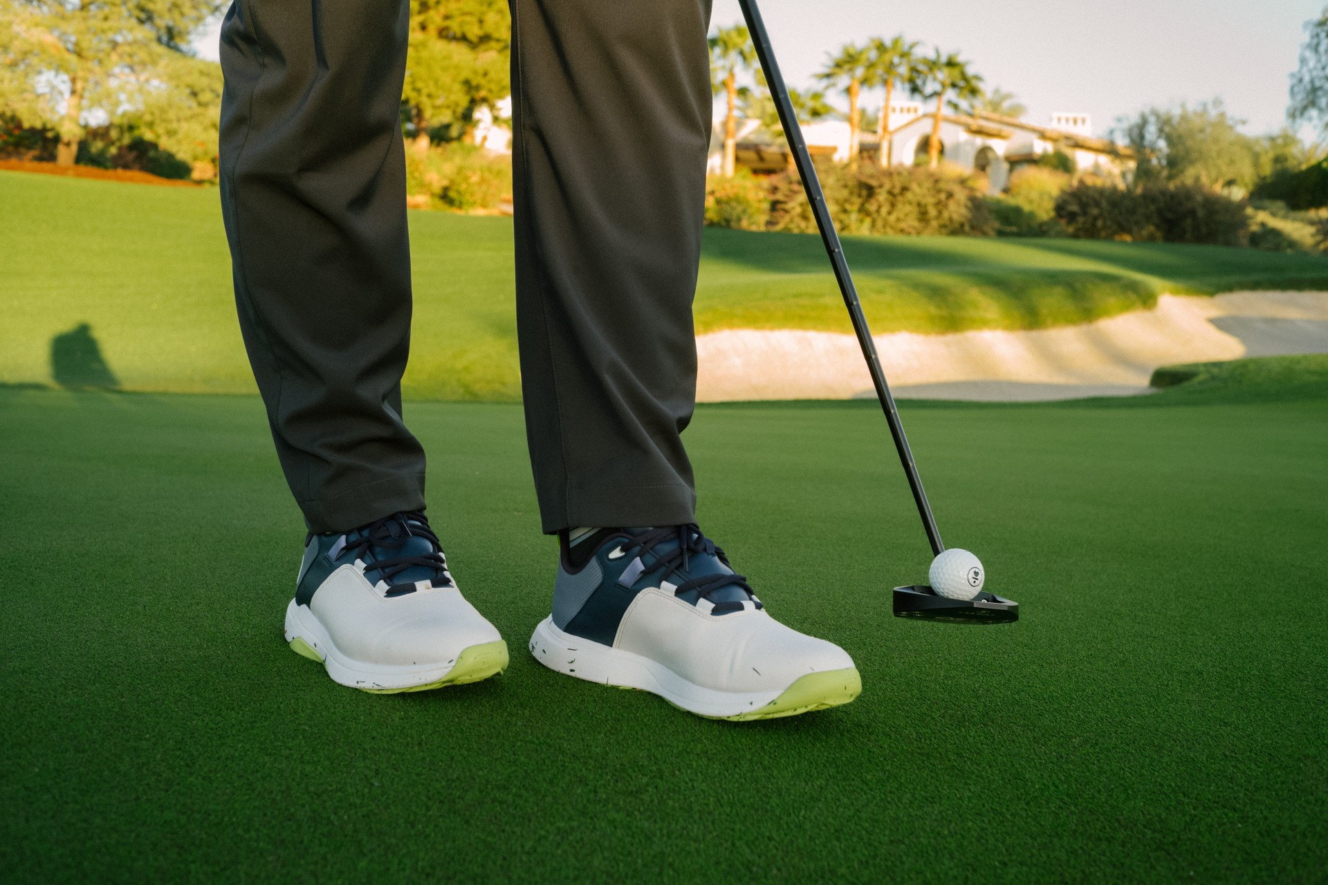 a person playing golf on a golf course