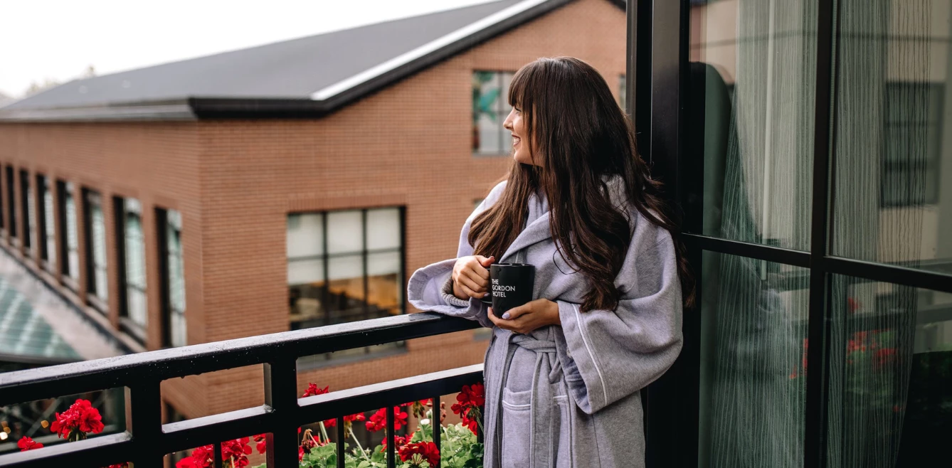 a woman holding a phone
