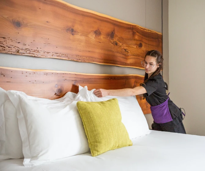 a woman in a hotel room