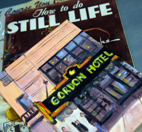 a painting of a hotel on a magazine