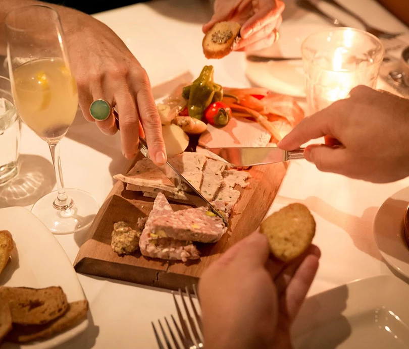 a group of people eating food
