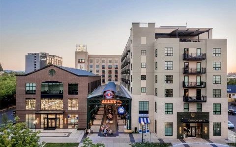 two large buildings with an alley in between them