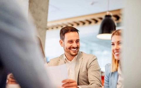 a man and a woman smiling