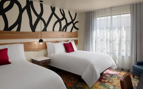 two beds in a hotel room