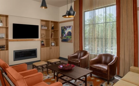 a living room with a fireplace