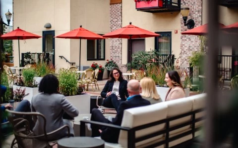 a group of people sitting outside