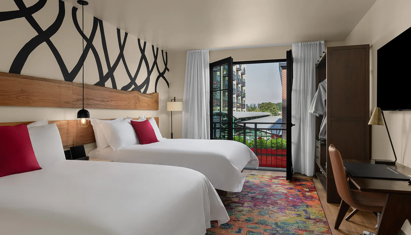 a hotel room with two beds