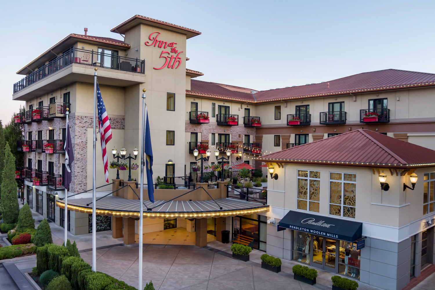 a building with flags and a flagpole