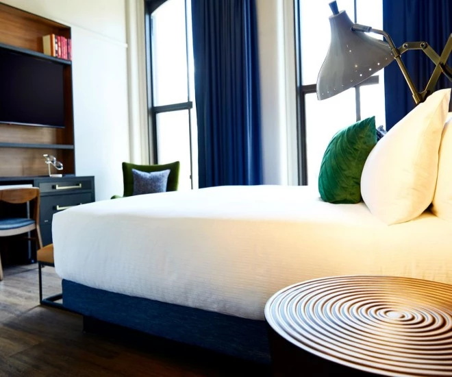 king bed with table and tv stand