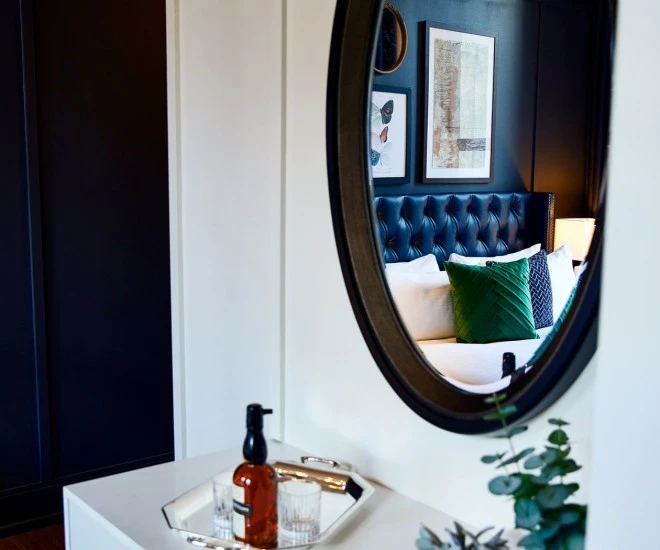 king bed with table and tv stand