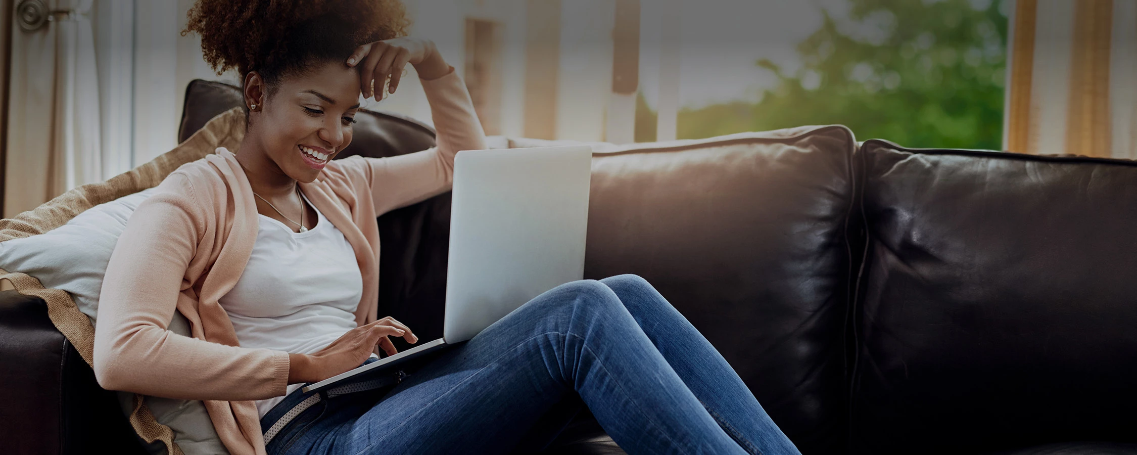 a woman sitting on a couch