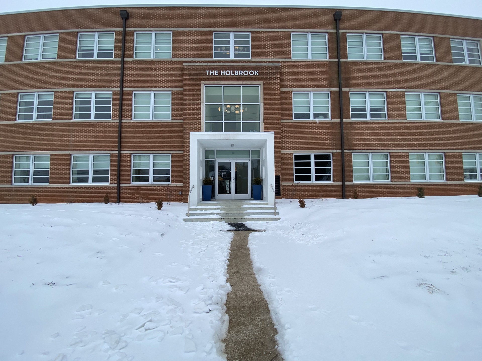 a building with snow on the ground