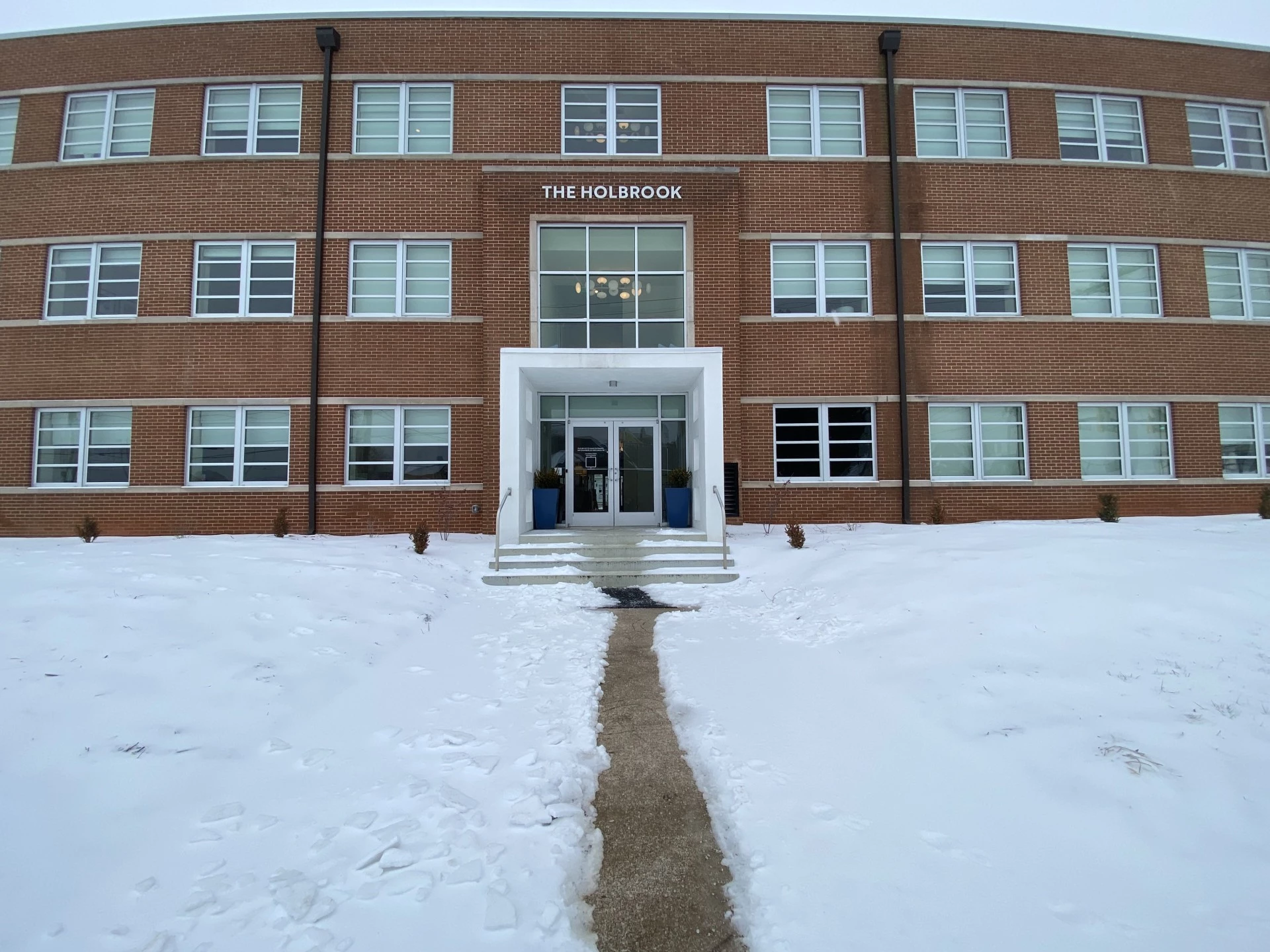 a building with snow on the ground