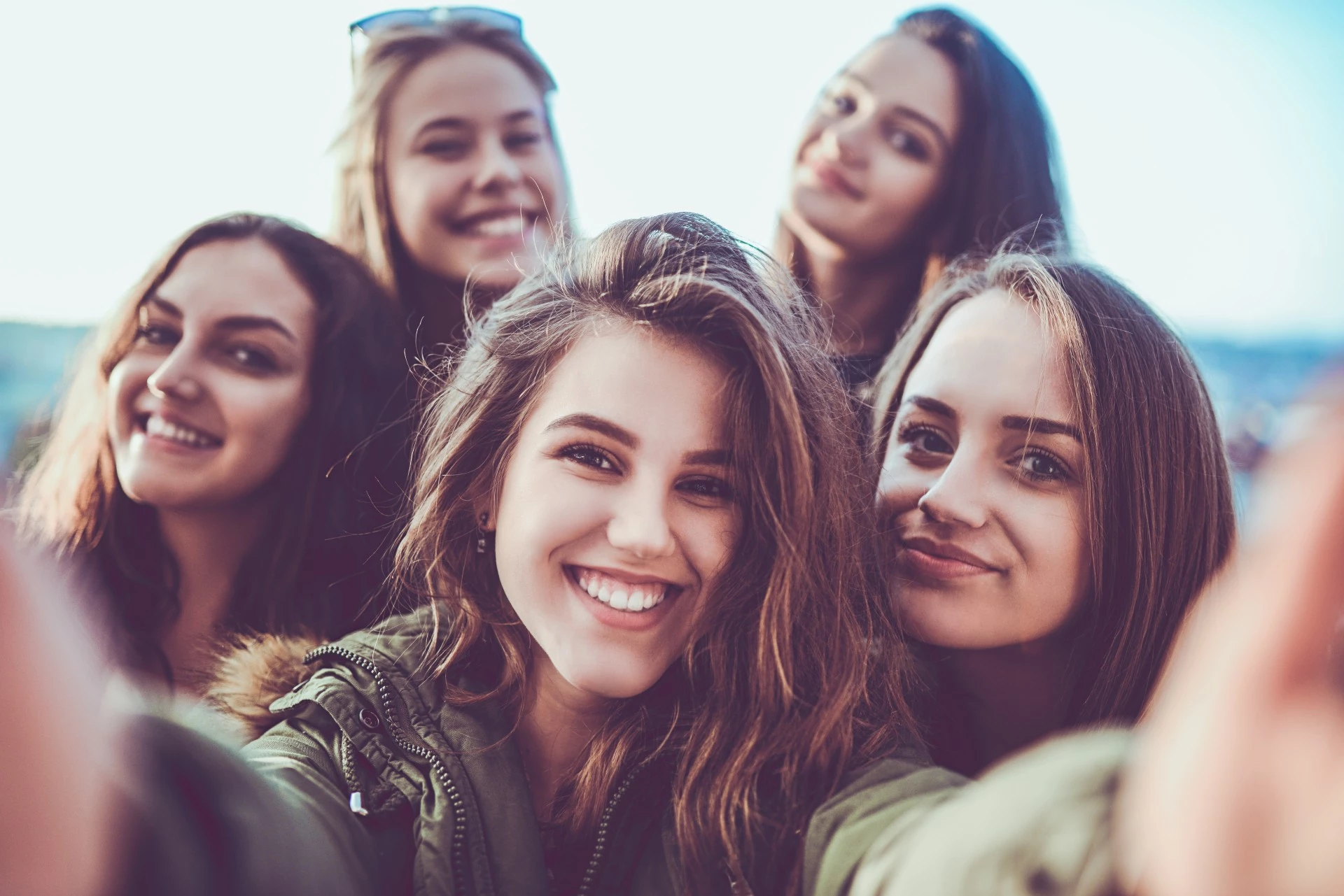 a group of women taking a selfie