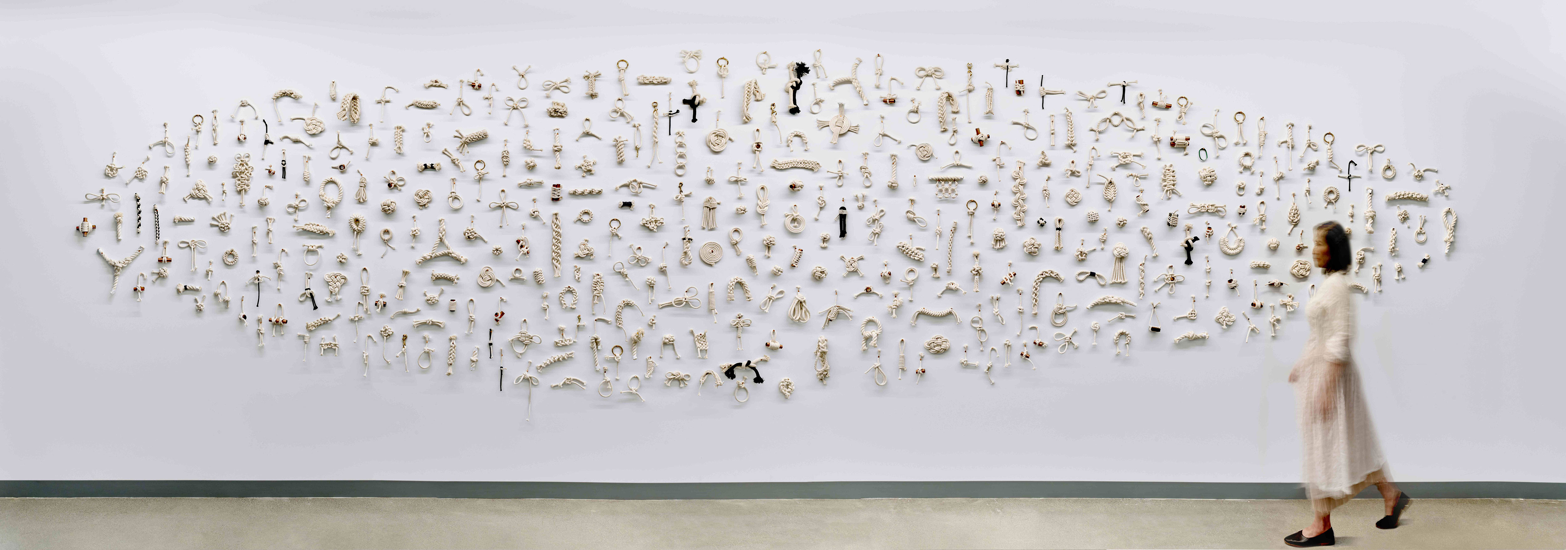 a wall with many different objects on it
