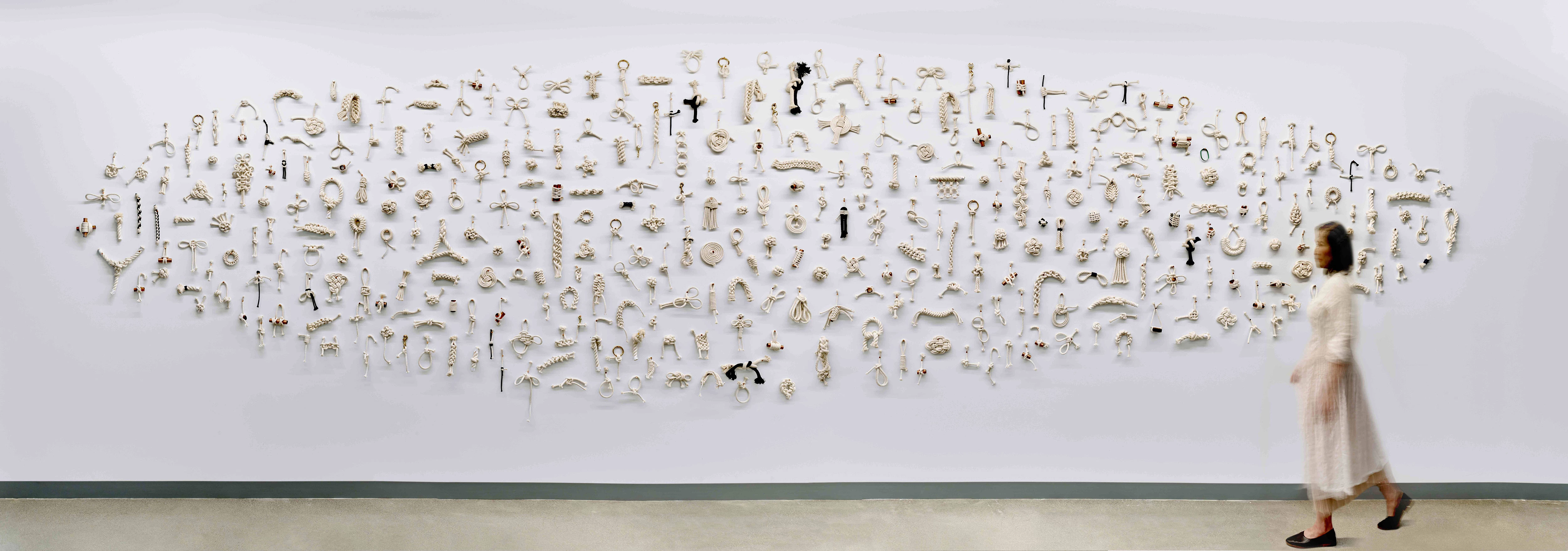 a wall with many different objects on it