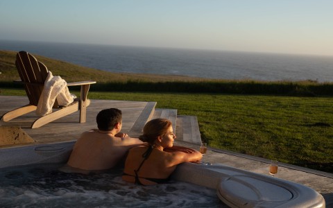 a couple in a hot tub