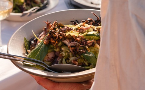 a bowl of food with a spoon