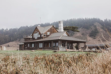 a house with a large field of grass
