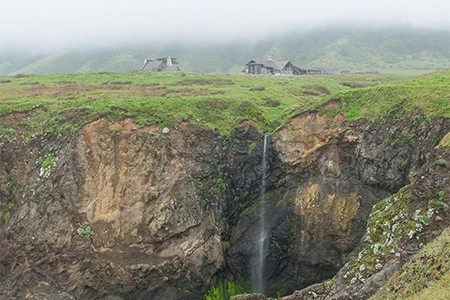 a waterfall in a cliff