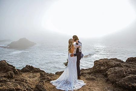 a man and woman in a wedding dress