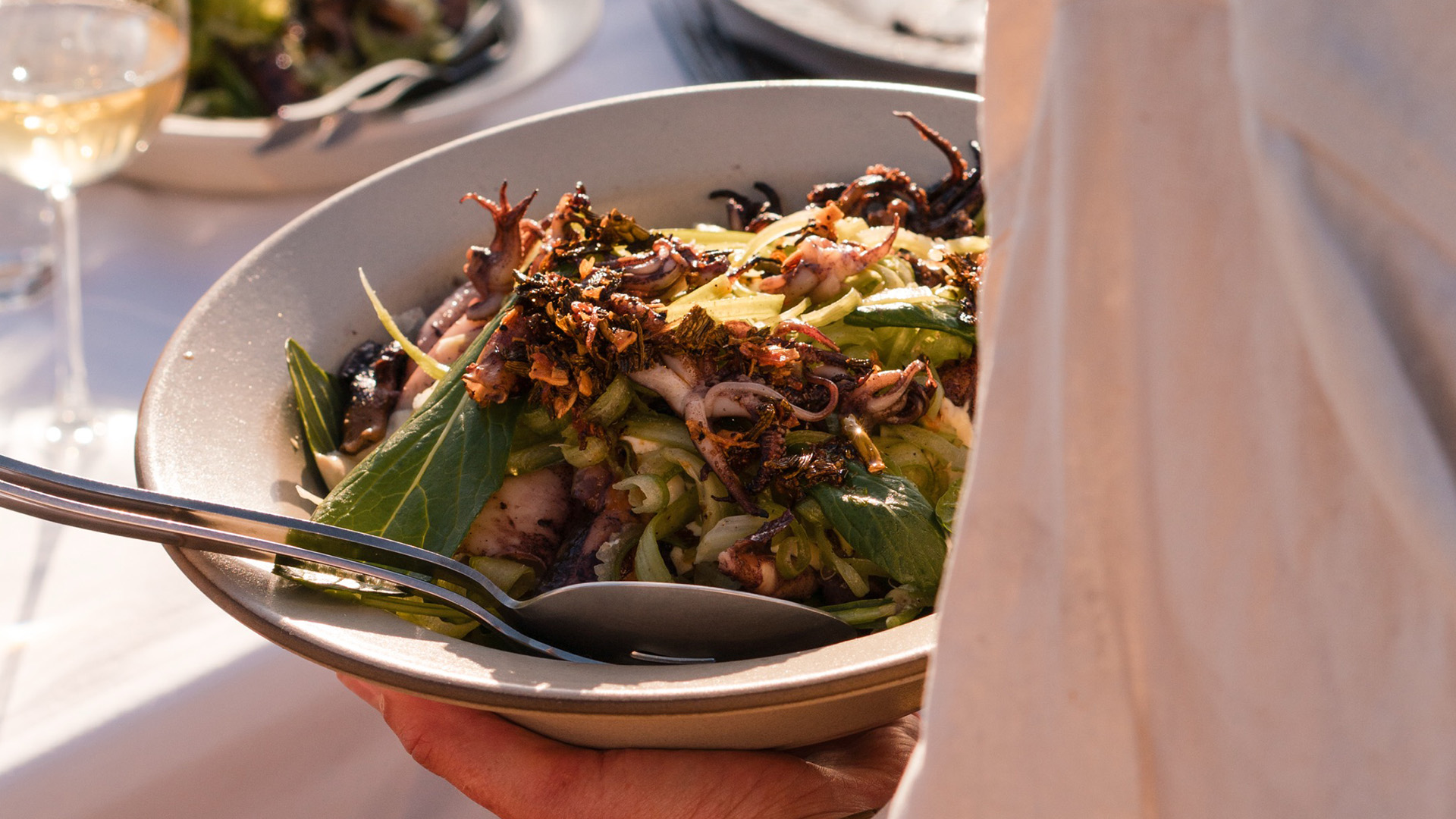 a bowl of food with a spoon