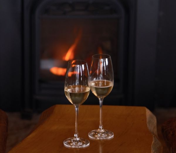 two glasses of wine on a table